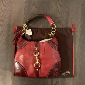 Authentic red Coach purse. New.